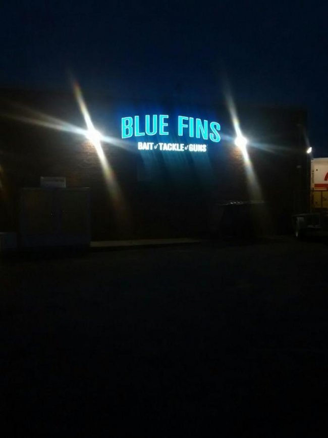 blue fins sign at night.jpg