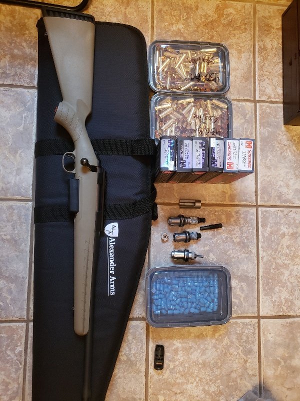 Ruger America 450BM with reloading supplies