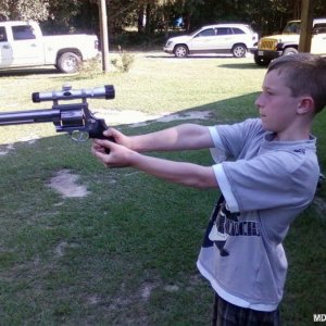 My Son Holding The S&w 500